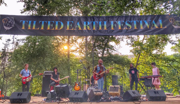 Musicians on stage at the Tilted Earth Music Festival