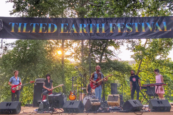 Musicians on stage at the Tilted Earth Music Festival